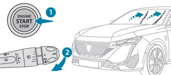 Peugeot 308 > Antes de desmontar una escobilla del